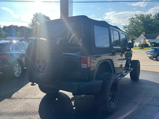 used 2016 Jeep Wrangler Unlimited car, priced at $17,987