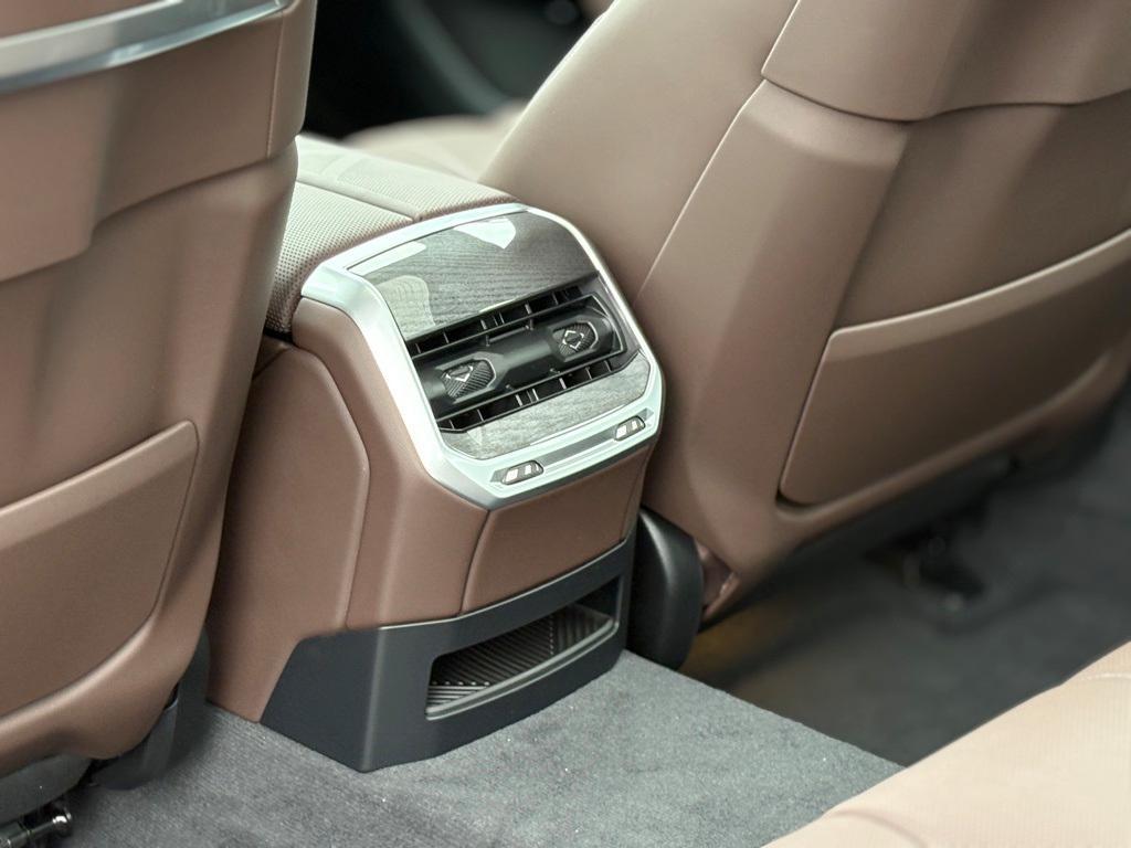 new 2025 BMW 740 car, priced at $110,655