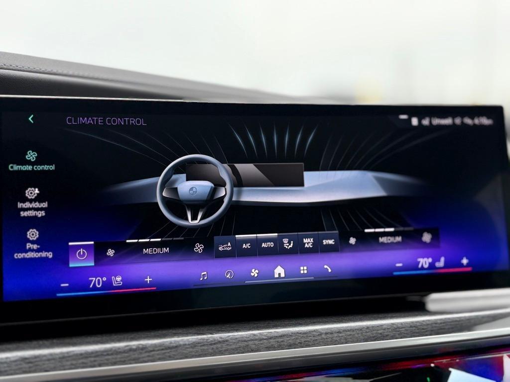new 2025 BMW 740 car, priced at $110,655