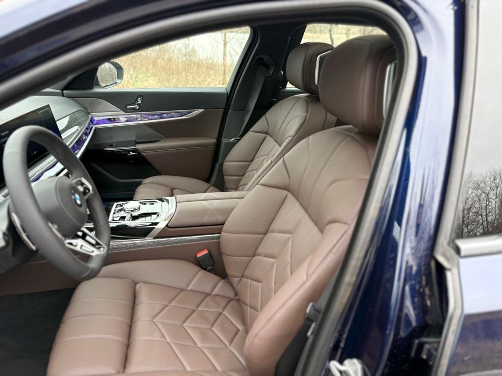 new 2025 BMW 740 car, priced at $110,655