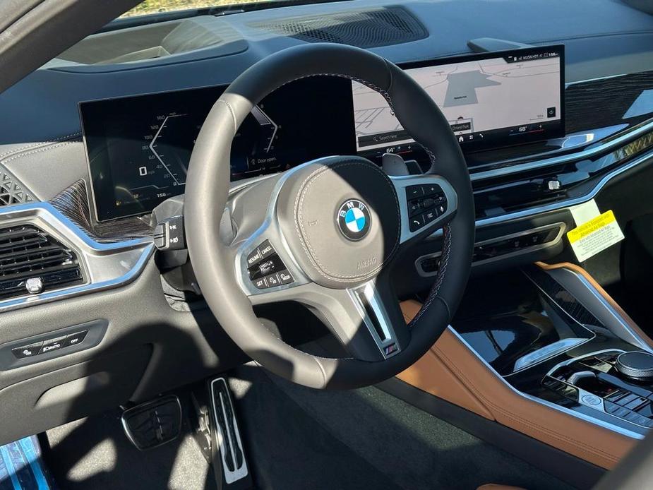 new 2025 BMW X6 car, priced at $99,075