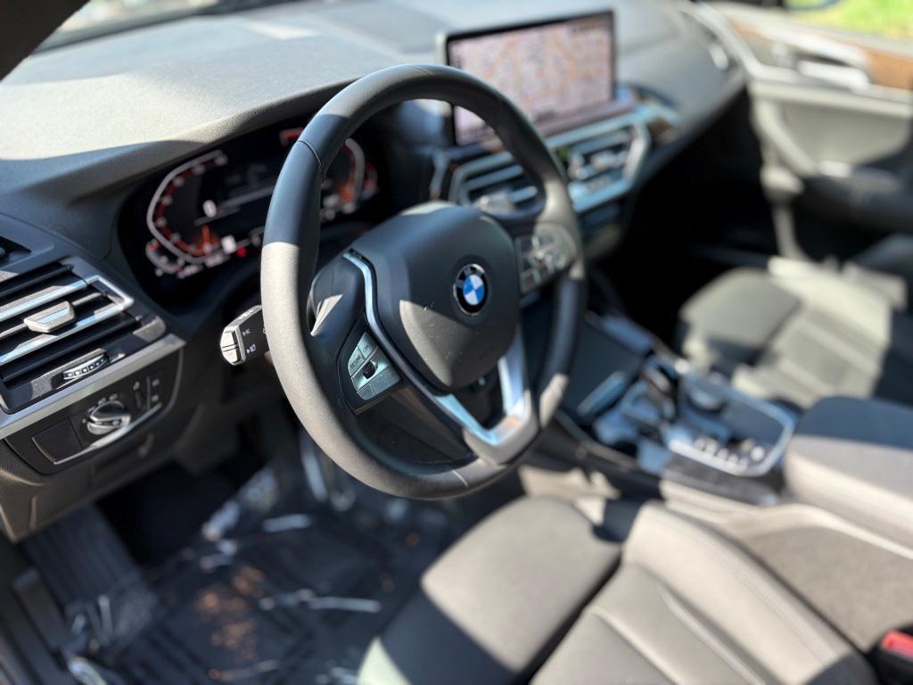 used 2024 BMW X4 car, priced at $42,099
