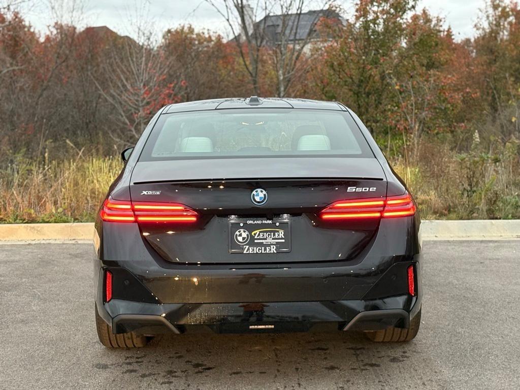 new 2025 BMW 550e car, priced at $80,305