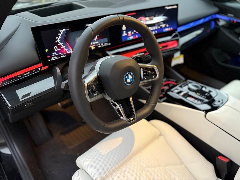 new 2025 BMW 550e car, priced at $80,305