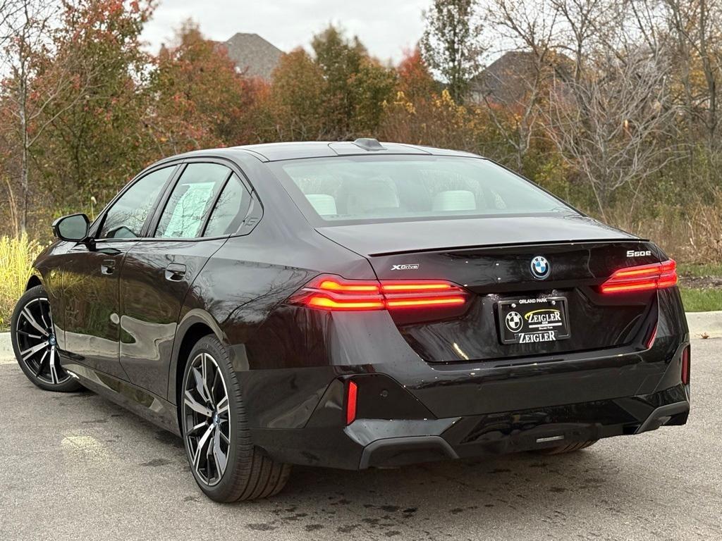 new 2025 BMW 550e car, priced at $80,305