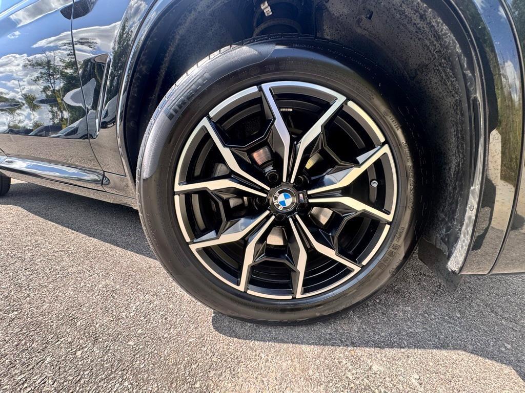 used 2025 BMW X4 car, priced at $52,099