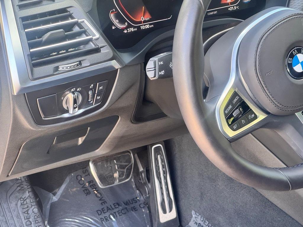 used 2025 BMW X4 car, priced at $52,099