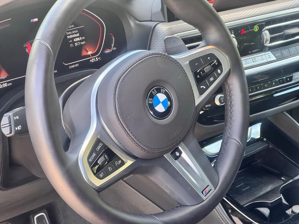 used 2025 BMW X4 car, priced at $52,099