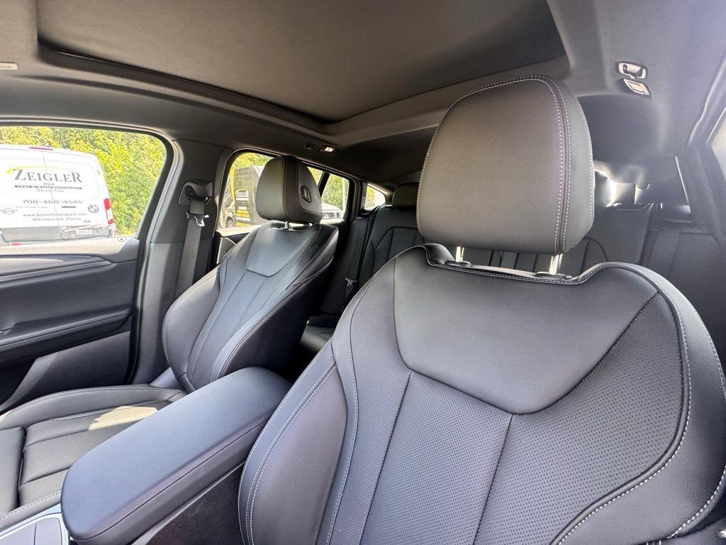 used 2025 BMW X4 car, priced at $52,099