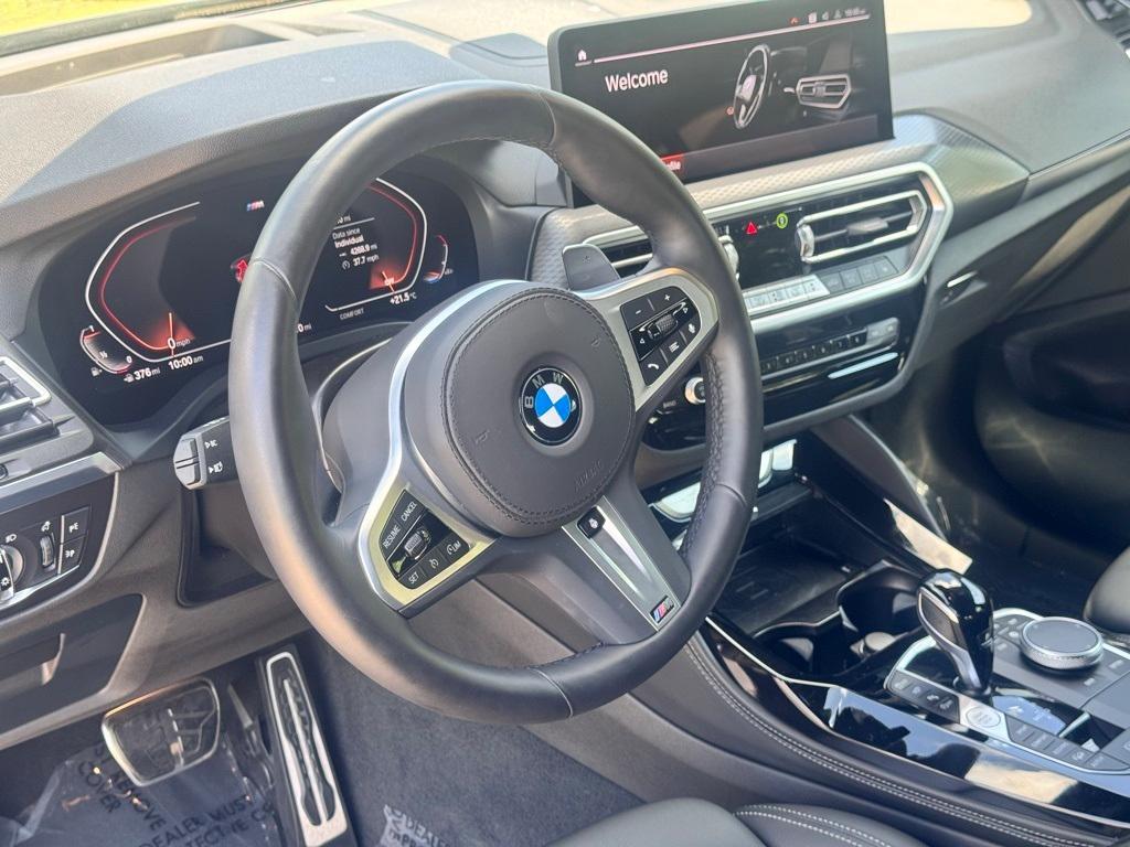 used 2025 BMW X4 car, priced at $52,099
