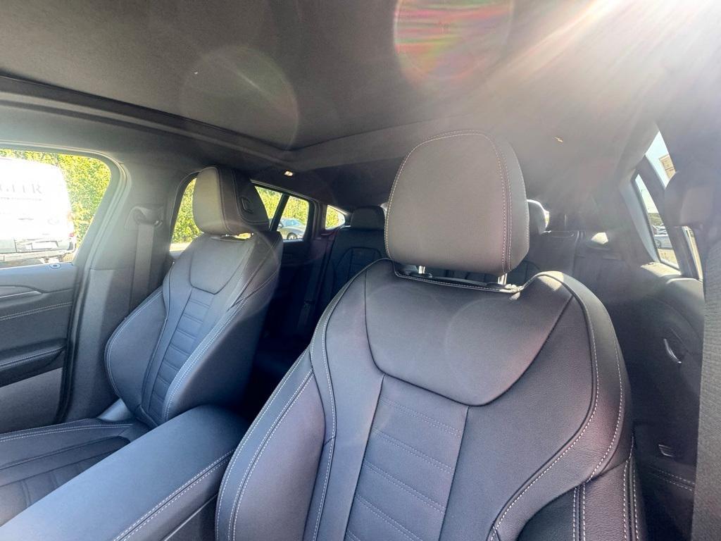new 2025 BMW X4 car, priced at $67,200