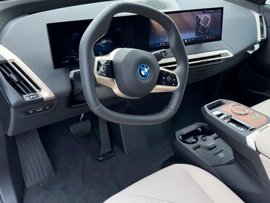 new 2024 BMW iX car, priced at $98,845