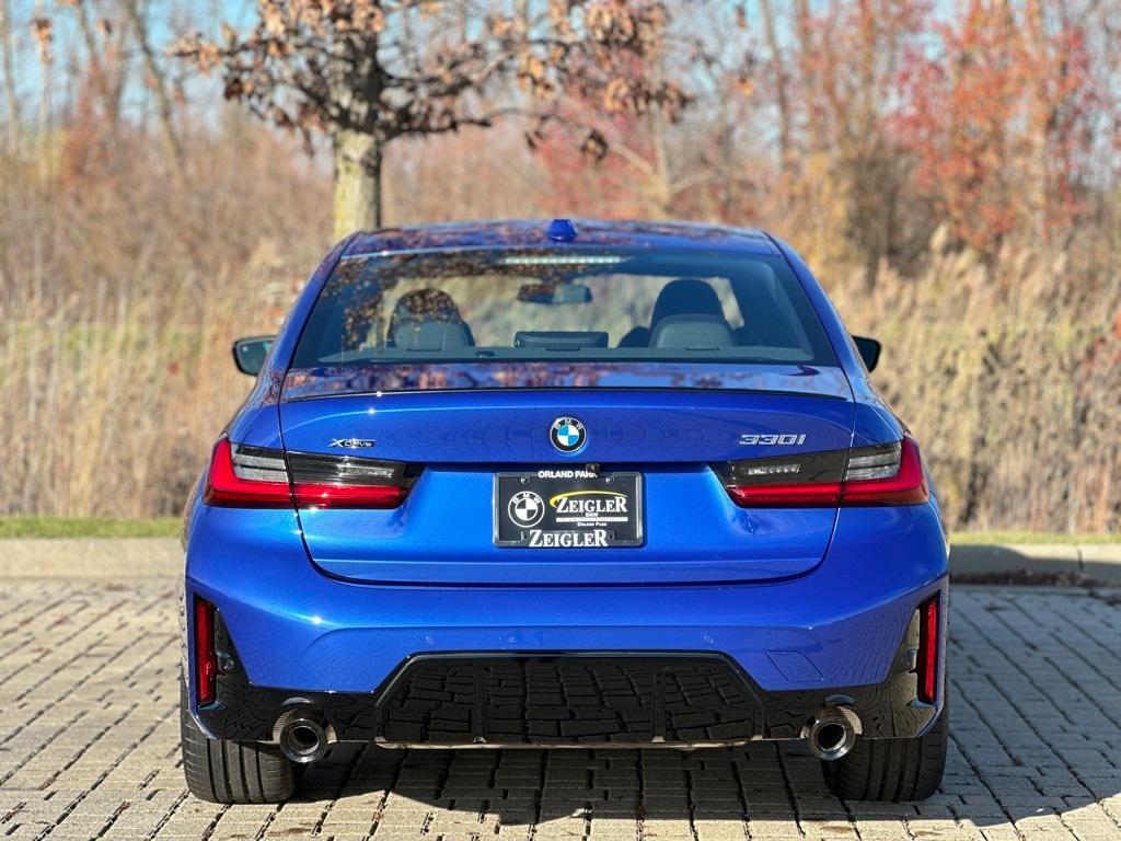 new 2025 BMW 330 car, priced at $55,850