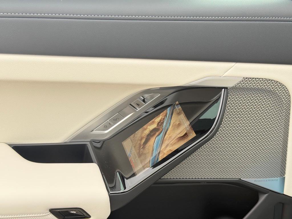 new 2025 BMW 740 car, priced at $111,670