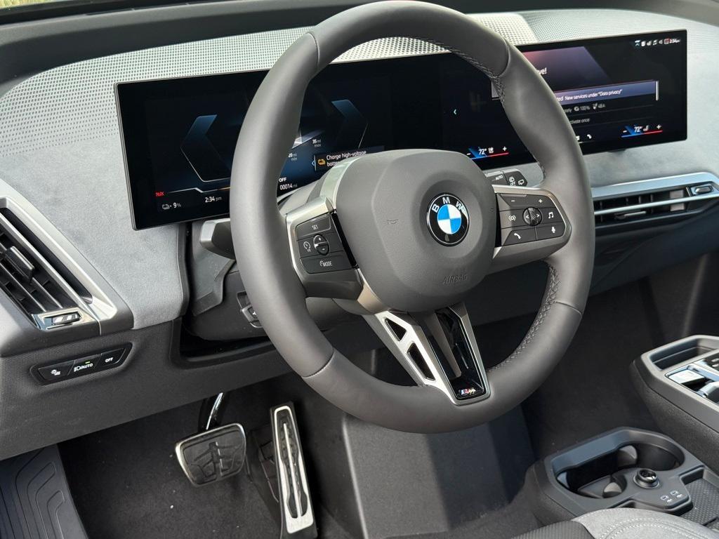new 2026 BMW iX car, priced at $103,475