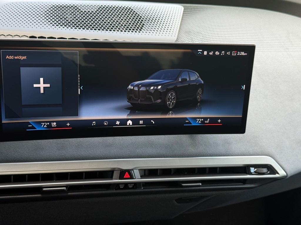 new 2026 BMW iX car, priced at $103,475
