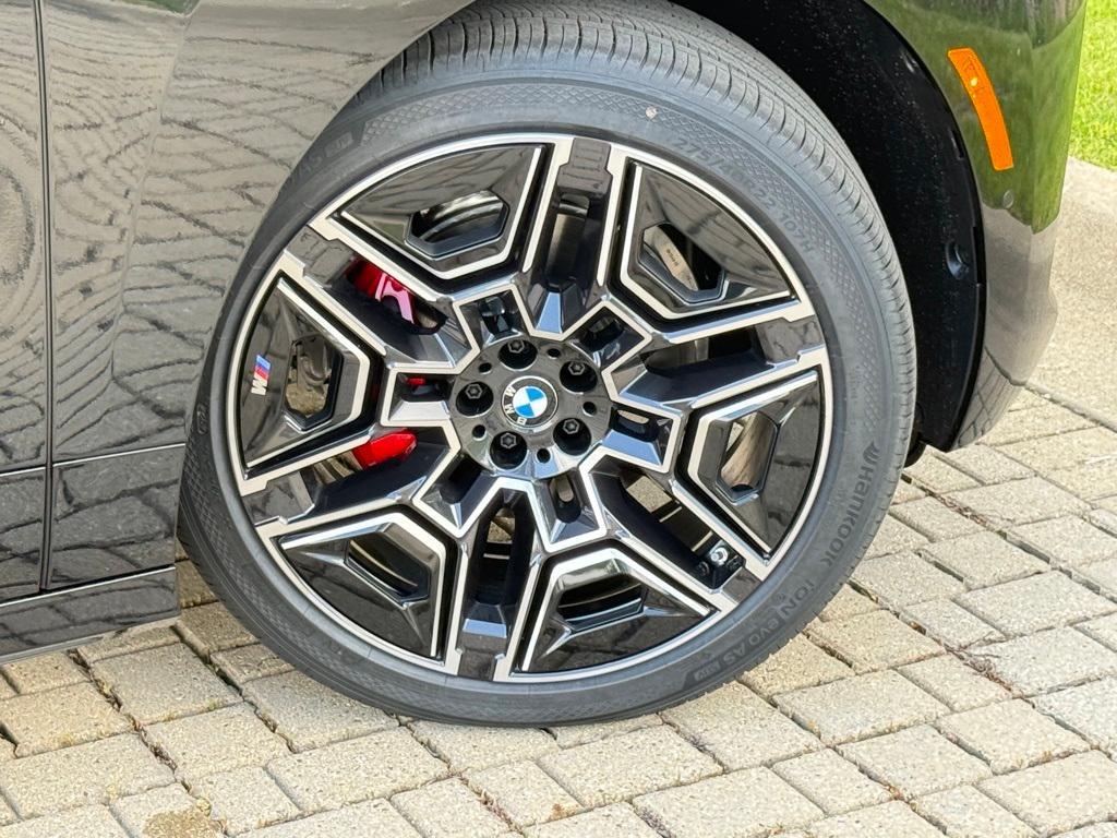 new 2026 BMW iX car, priced at $103,475