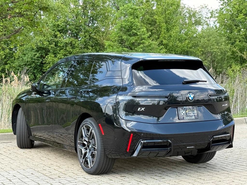 new 2026 BMW iX car, priced at $103,475