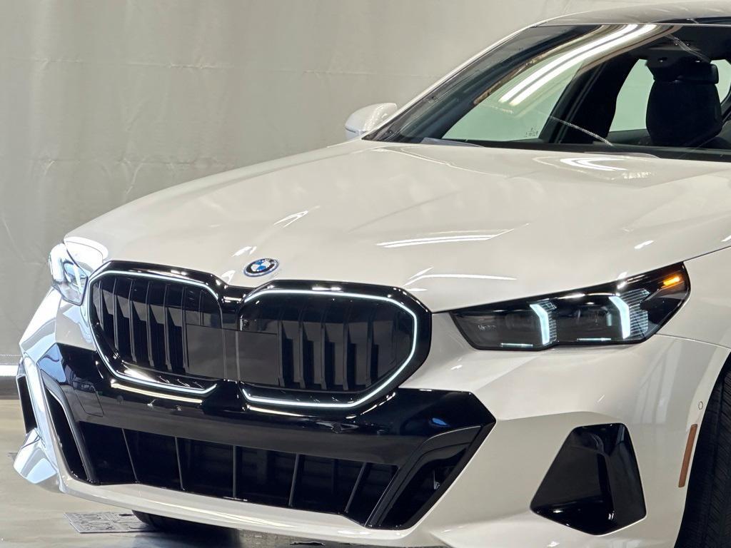 new 2025 BMW 550e car, priced at $78,310