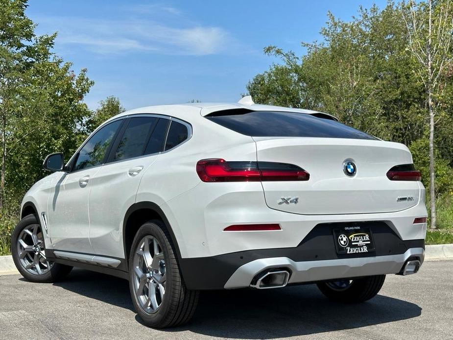 used 2024 BMW X4 car, priced at $52,996