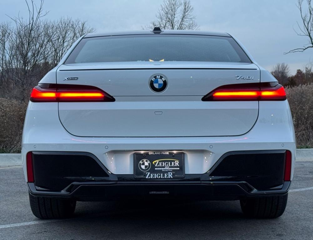 new 2025 BMW 740 car, priced at $105,375