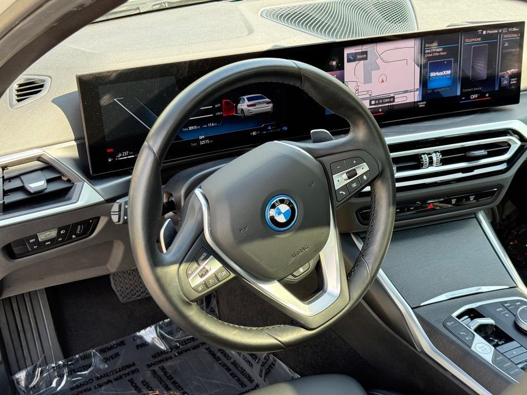 used 2024 BMW 330e car, priced at $33,499