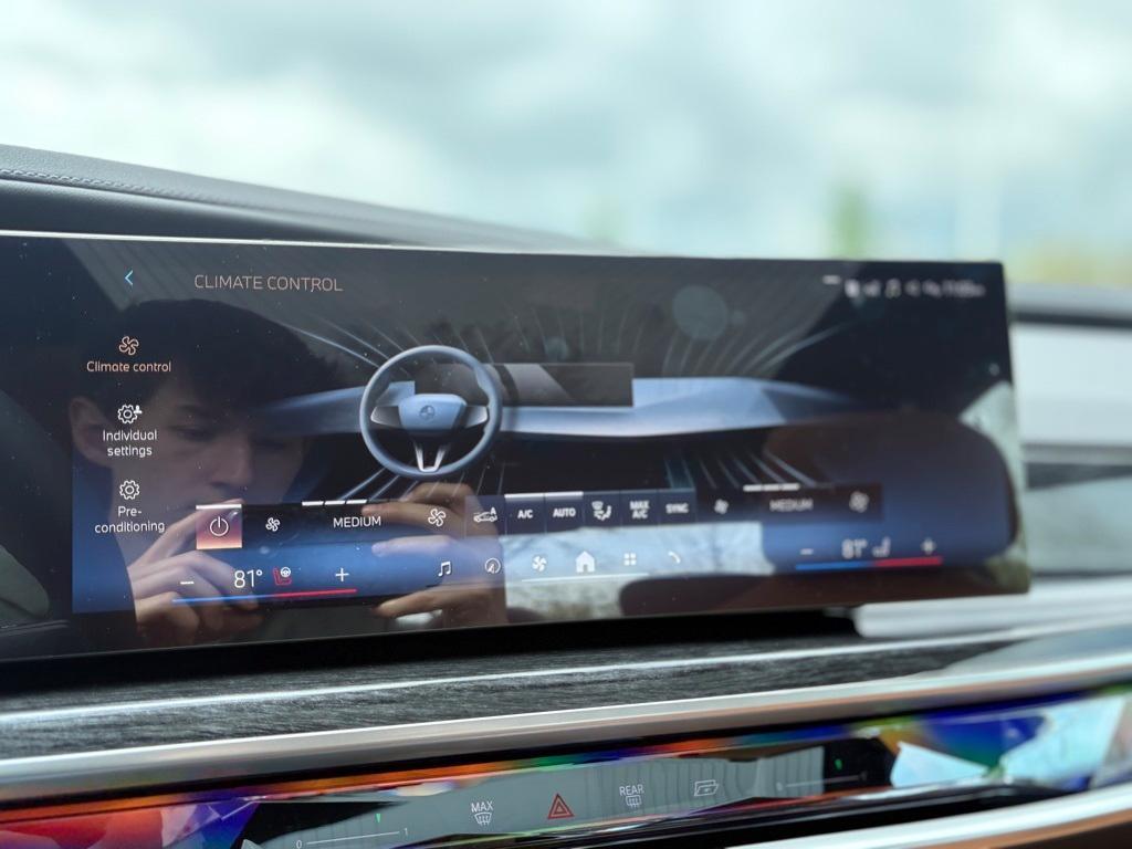 new 2025 BMW 740 car, priced at $105,355