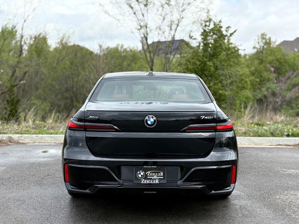 new 2025 BMW 740 car, priced at $105,355