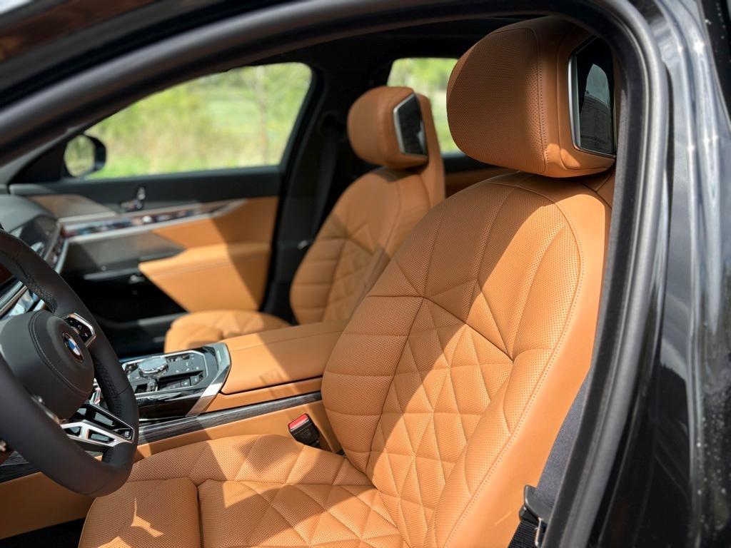 new 2025 BMW 740 car, priced at $105,355
