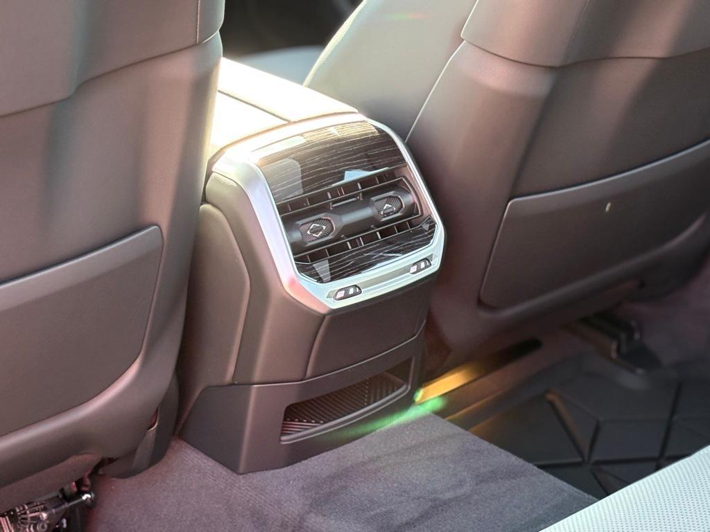 new 2025 BMW 740 car, priced at $111,055