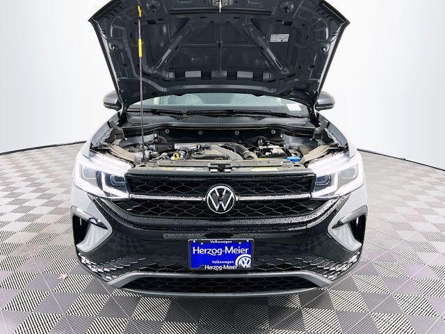 used 2024 Volkswagen Taos car, priced at $28,188