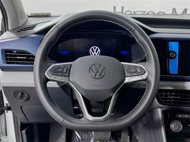 used 2023 Volkswagen Taos car, priced at $28,598