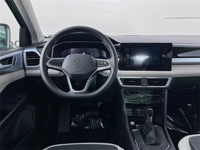 new 2025 Volkswagen Taos car, priced at $32,856