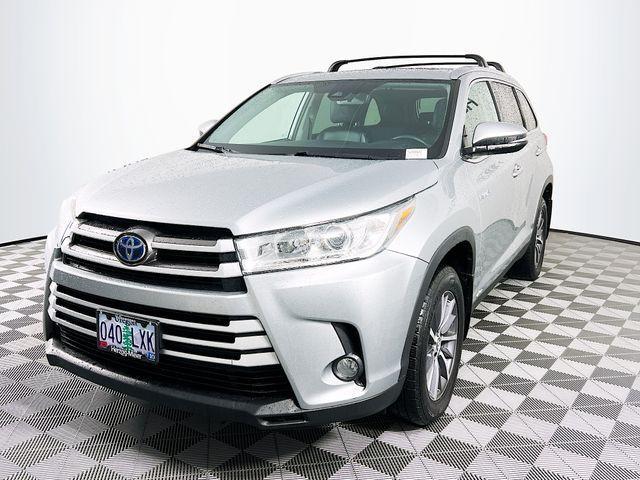 used 2019 Toyota Highlander Hybrid car, priced at $26,488
