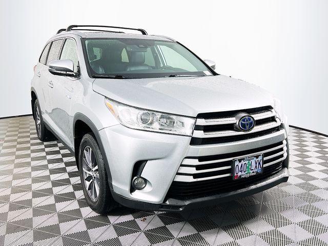 used 2019 Toyota Highlander Hybrid car, priced at $26,488