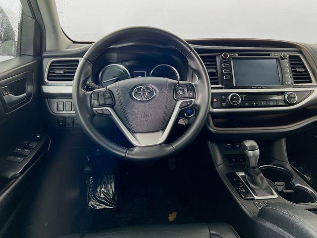 used 2019 Toyota Highlander Hybrid car, priced at $26,488