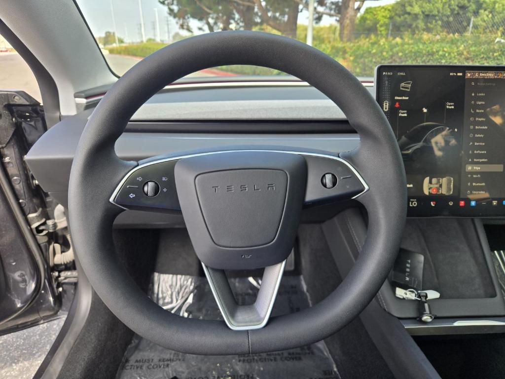 used 2024 Tesla Model 3 car, priced at $31,694