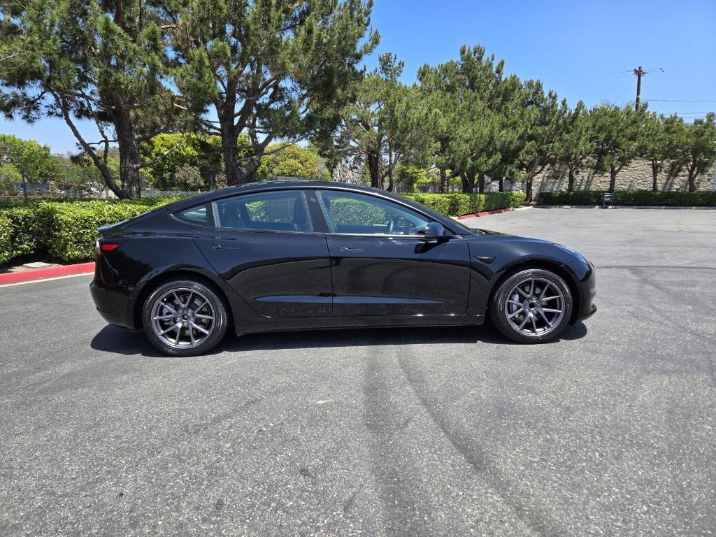 used 2021 Tesla Model 3 car, priced at $23,500