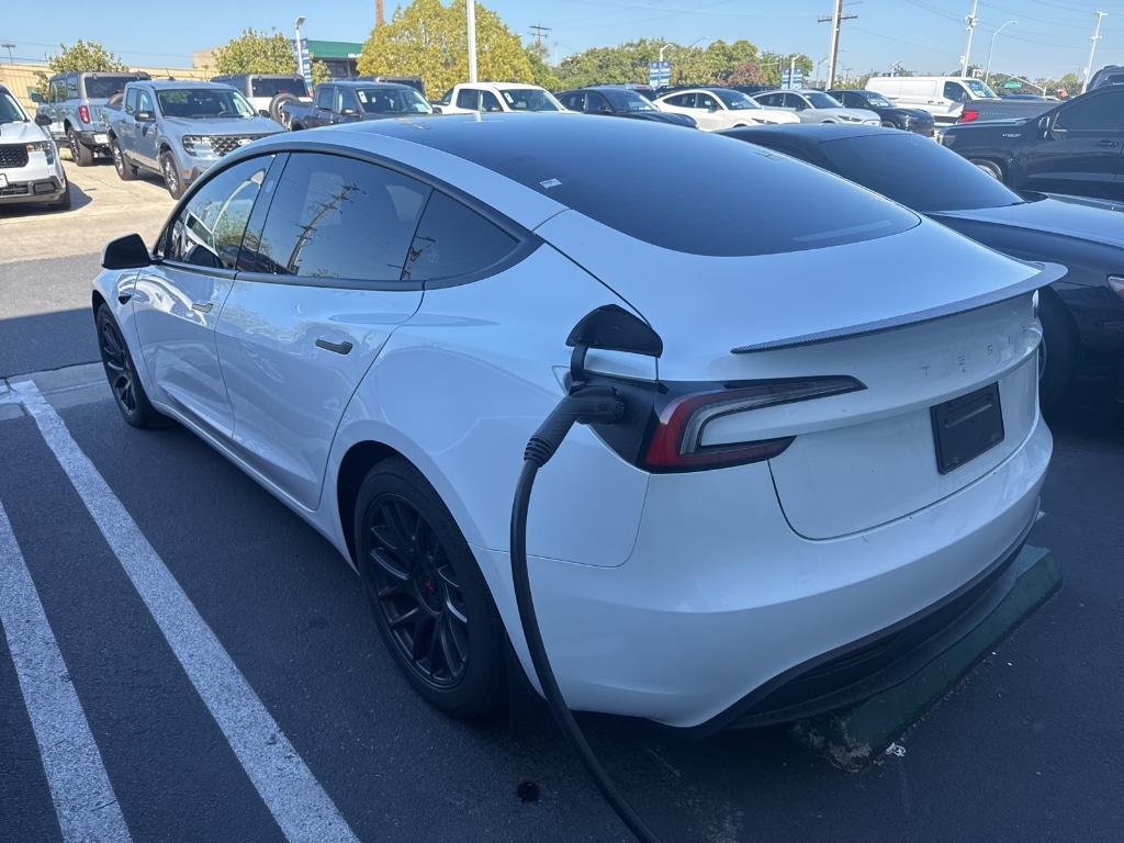 used 2024 Tesla Model 3 car, priced at $32,486