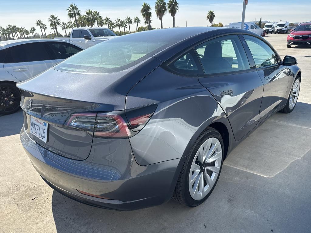 used 2023 Tesla Model 3 car, priced at $25,500