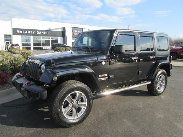 used 2013 Jeep Wrangler Unlimited car, priced at $15,590