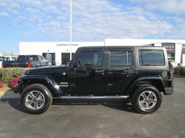 used 2013 Jeep Wrangler Unlimited car, priced at $15,590