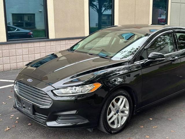 used 2015 Ford Fusion car, priced at $10,878