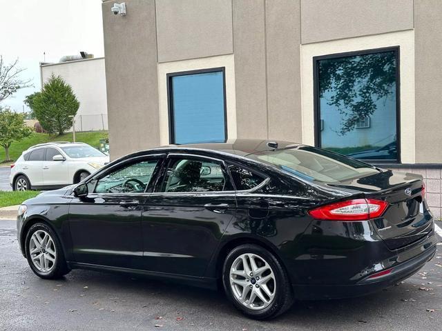 used 2015 Ford Fusion car, priced at $10,878