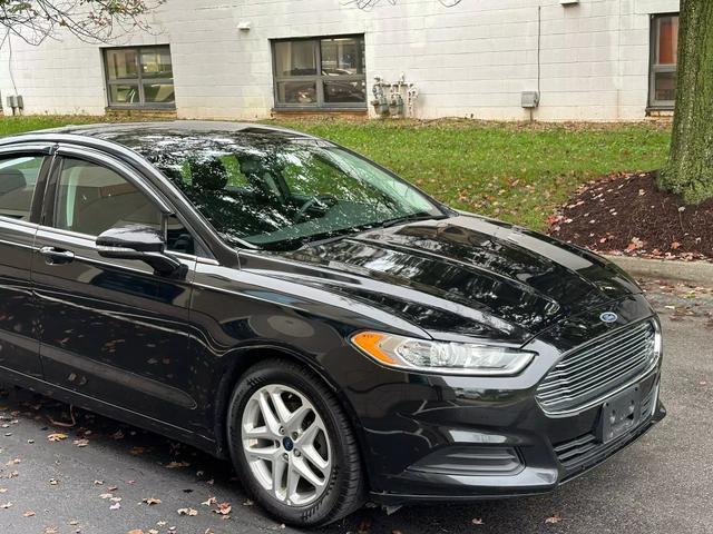 used 2015 Ford Fusion car, priced at $10,878