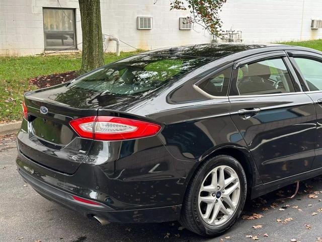 used 2015 Ford Fusion car, priced at $10,878