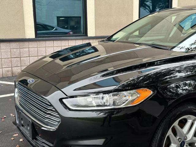 used 2015 Ford Fusion car, priced at $10,878