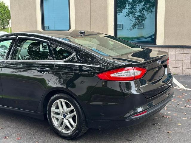 used 2015 Ford Fusion car, priced at $10,878