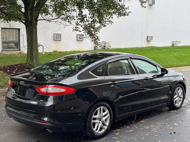 used 2015 Ford Fusion car, priced at $10,878