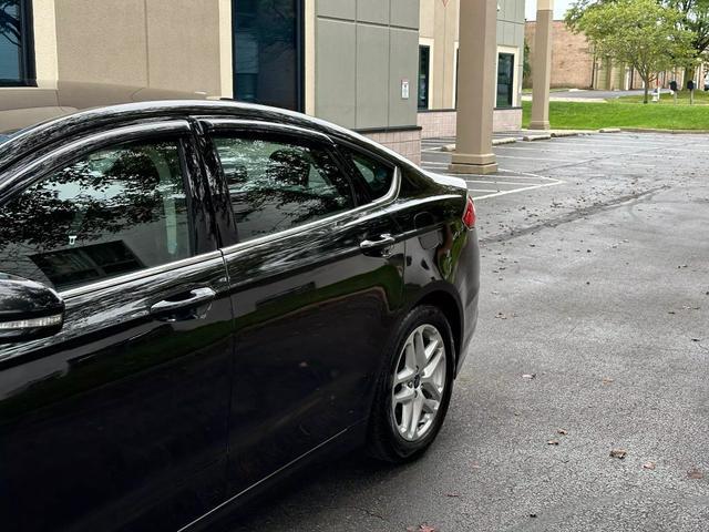 used 2015 Ford Fusion car, priced at $10,878